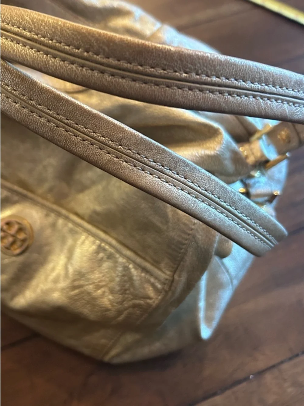 The Tory Burch Shimmer Gold Dean Hobo Bag MSRP 590.00